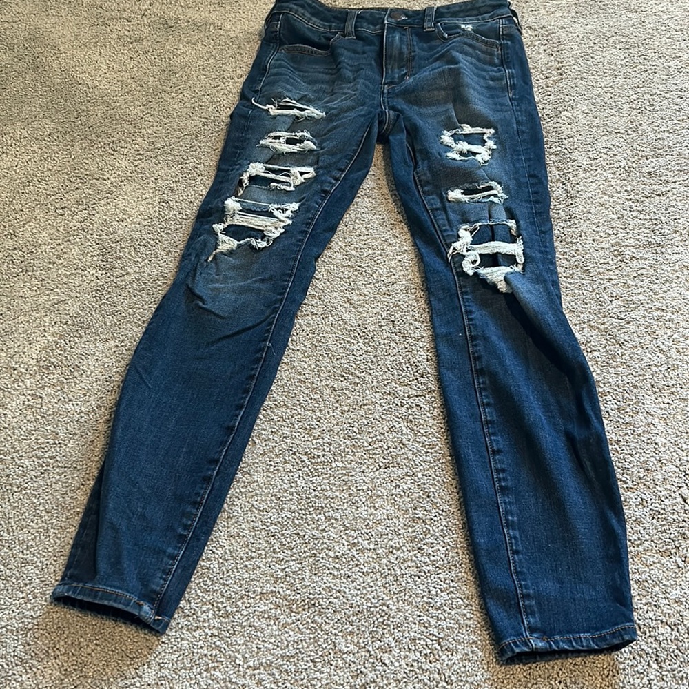 American Eagle Next Level Stretch dark blue ripped (lined) jeans